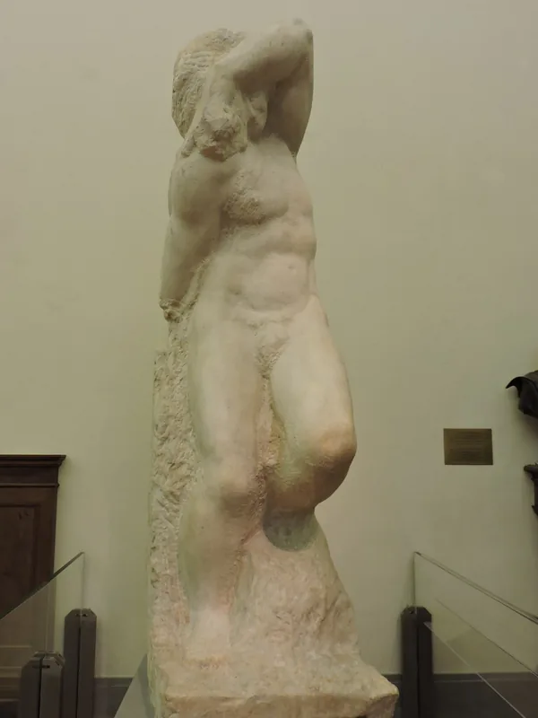 Michelangelo's unfinished marble Young Slave, Galleria dell'Accademia, Florence